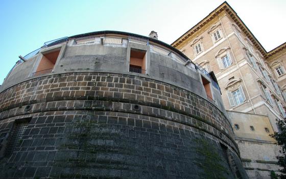 The headquarters of the Institute for the Works of Religion, commonly known as the Vatican bank, with the apostolic palace in background (NCR photo/Joshua J. McElwee)